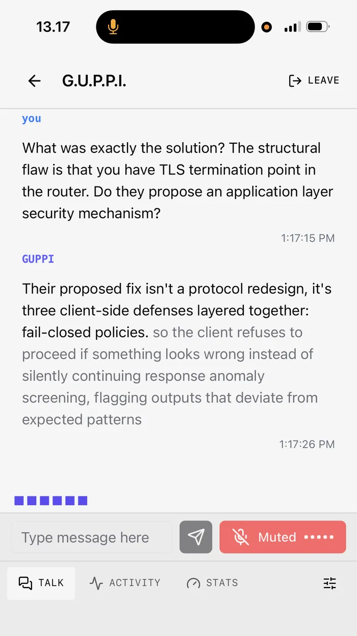 A GUPPI session in the phone app: I ask about a TLS termination flaw, GUPPI speaks the short answer and the rest lands on screen in grey